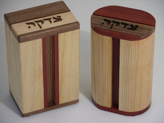 Tzedakah Boxes (EC18) featuring laser-engraved Hebrew text on premium hardwood with maple body and contrasting wood accents for religious giving.