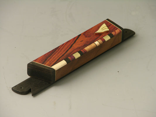 EC7 mezuzah case with cocobolo body, ebony accents, and gold-plated shin; side inlay of hardwoods and brass.